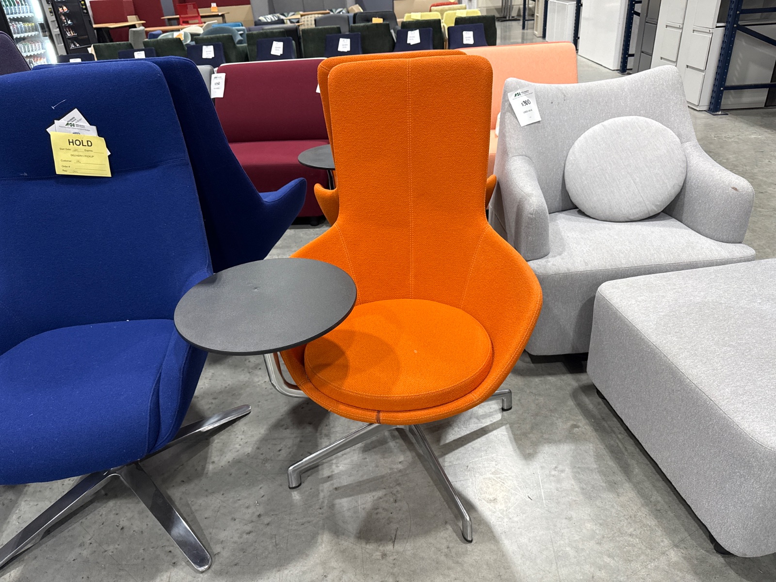 KEILHAUER Orange High-Back Lounge Chair with Tablet